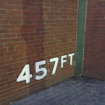 457ft printed on brick wall.